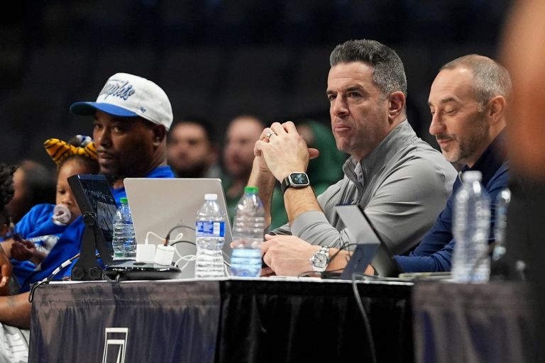 American Conference Commissioner Tim Pernetti watches during the first round American Conference Tournament game between Memphis and Tulane in Birmingham, Ala, on March 11, 2026.