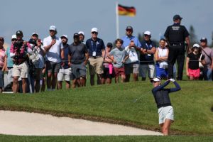 Jun 27, 2026; Chaska, Minnesota, USA; Nelly Korda hits from a fairway bunker on the first hole during the third round of the KPMG Women's PGA Championship golf tournament.