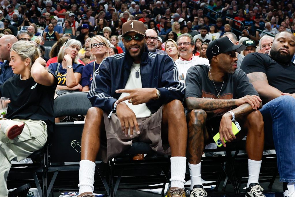 Aug 20, 2026; Dallas, Texas, USA; Basketball Hall of Famer Tracy McGrady looks on during the first half between the Dallas Wings and Indiana Fever at American Airlines Center.