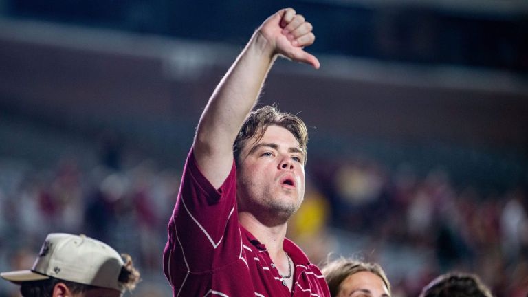 A Florida State fan holds up a thumbs down signal while yelling boo at Florida State Seminoles head coach Mike Norvell after the Seminoles lost to the SMU Mustangs on Monday, Sept. 7, 2026.