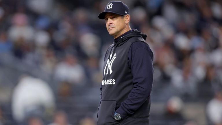 Sep 25, 2026; Bronx, New York, USA; New York Yankees manager Aaron Boone (17) walks back to the dugout after making a pitching change during the third inning against the Baltimore Orioles at Yankee Stadium. Mandatory Credit: Brad Penner-Imagn Images