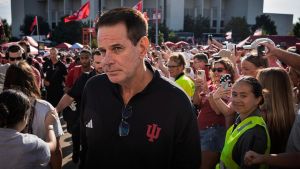 Head Coach Curt Cignetti heads in during The Walk before the Indiana versus North Texas football game at Memorial Stadium on Saturday, Sept. 5, 2026. Brian and Amy were the hosts, middle two in frame.