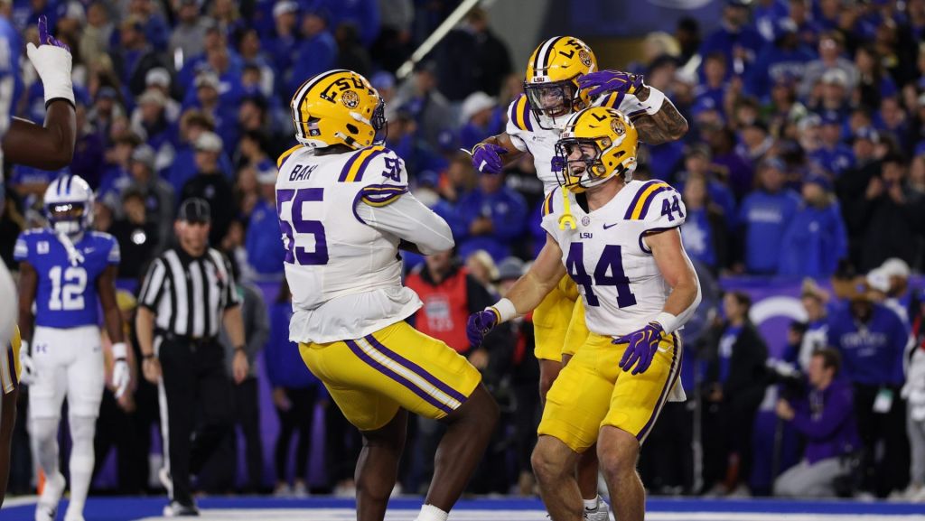 Oct 10, 2026; Lexington, Kentucky, USA; LSU Tigers tight end Zach Grace (44) celebrates after scoring a touchdown with offensive lineman Aliou Bah (55) and wide receiver Eugene Wilson III (3) during the first quarter against the Kentucky Wildcats at Kroger Field.
