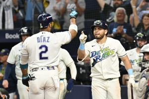 Oct 19, 2026; St. Petersburg, Florida, USA; Tampa Bay Rays designated hitter Yandy Diaz (2) celebrates with teammates after hitting a two run home run against the Cleveland Guardians during the eighth inning in game six of the ALCS for the 2026 MLB Playoffs at Tropicana Field.