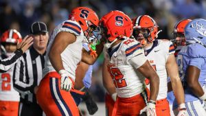 Oct 24, 2026; Chapel Hill, North Carolina, USA; Syracuse Orange running back Ahmad Miller (22) celebrates scoring a touchdown during the fourth quarter against North Carolina Tar Heels at Kenan Stadium.