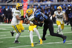 Oct 25, 2026; Detroit, Michigan, USA; Detroit Lions defensive end Aidan Hutchinson (97) sacks Green Bay Packers quarterback Jordan Love (10) during the second quarter at Ford Field.
